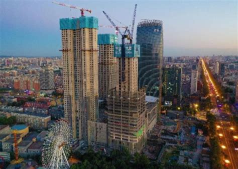 中建三局长春华润中心项目住宅及公寓塔楼主体结构封顶 - 中国网客户端