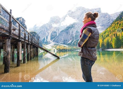 Woman at Lake Bries Standing Looking at Wooden Pier Stock Photo - Image ...