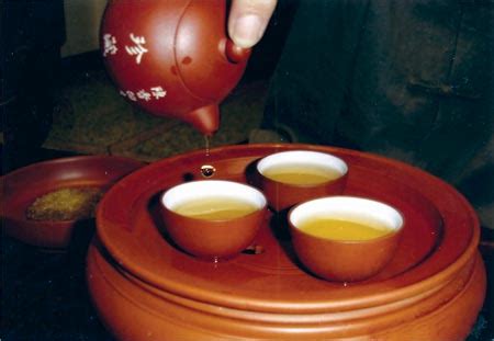 “满酒半茶”满族人的待客之道-法规习俗-回归旅游网