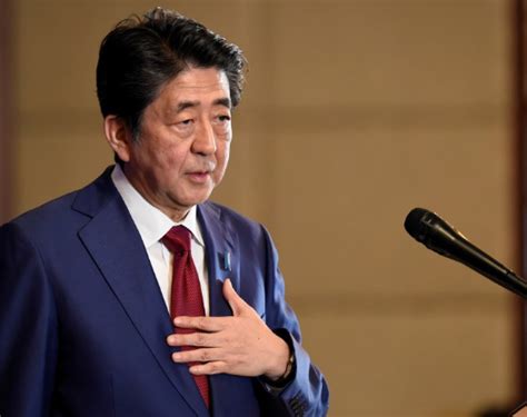 日本首相安倍晋三宣布辞去首相职务_时图_图片频道_云南网