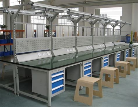 重型车间工作台带挂板钳工工作台天津厂家工位装备吊柜工作桌-阿里巴巴