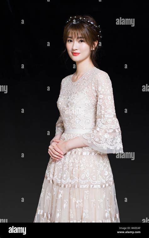 Chinese actress Qiao Xin, also known as Bridgette Qiao, poses for ...