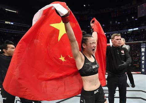 巾帼不让须眉！中国首位UFC冠军张伟丽击败波兰拳王，成功卫冕金腰带__财经头条