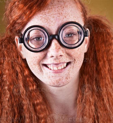 Cheerful freckled nerdy girl 945350 Stock Photo at Vecteezy