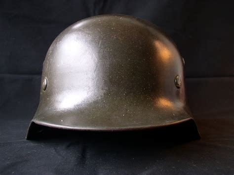 德国钢盔进化史：从华而不实的皮制钉盔，到经典的二战M35头盔|头盔|钢盔|尖顶_新浪新闻