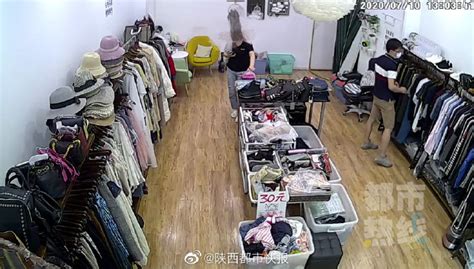女子买衣服偷店主钱包发现不合身回店更换 被店主警告后将其归还 - 西部网（陕西新闻网）