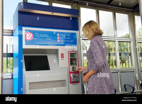 A man buying a rail ticket for an Amtrak train, Union Station ...