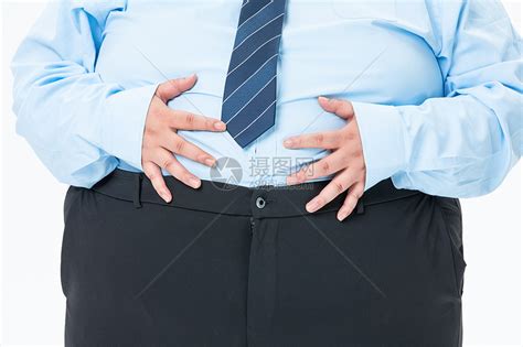肥胖商务男性摸着肚子高清图片下载-正版图片501413761-摄图网
