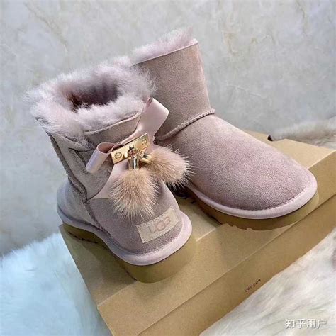 牛皮雪地靴女2021冬季新款中筒木纽扣加厚保暖雪地棉鞋子女鞋5803-阿里巴巴