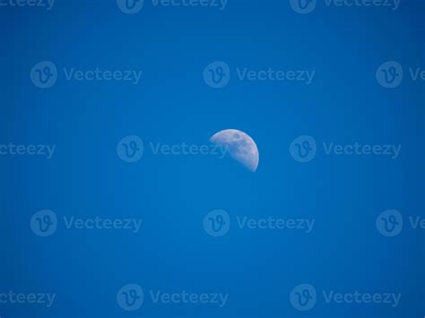 half moon in the blue sky 17324417 Stock Photo at Vecteezy