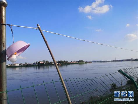 「新华网」严守汉江大堤——“洪水走廊”汉江汉川段见闻