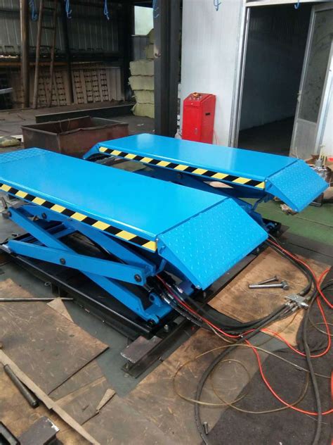 专业定制1吨2吨电动升降平台台面倾斜固定式升降台侧翻功能升降机-阿里巴巴