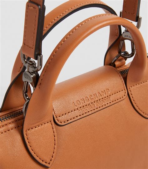 Longchamp brown Extra Small Leather Le Pliage Cuir Top-Handle Bag ...