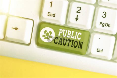概念手写显示公共谨慎概念意思是向公众发出正式警告以表达潜在风险白色pc键盘高清图片下载-正版图片503712719-摄图网