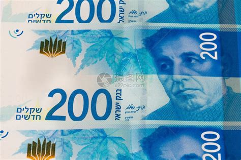 堆积着10谢克尔的以色列钞票高清图片下载-正版图片306875655-摄图网