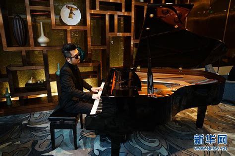 海南首个盲人钢琴调音师：梦在音乐里成长-新闻中心-南海网