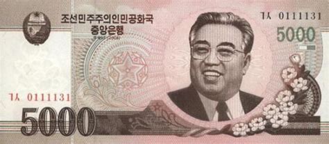 朝鲜印制新一批货币 仅为增加金正日肖像|朝鲜货币|金正日肖像_新浪新闻