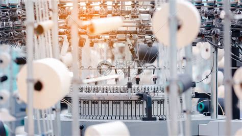 纺织品制造圆形针织面料纺织厂在纺纱生产线和旋转机械设备生产公司服装行业高清图片下载-正版图片506373413-摄图网
