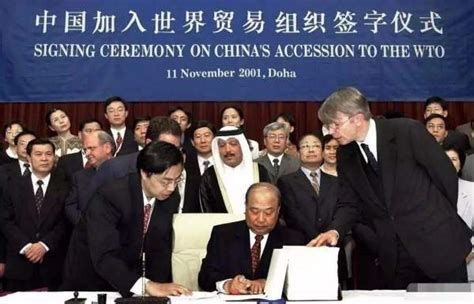 百年瞬间丨中国正式成为世界贸易组织第143个成员