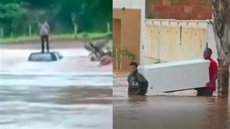 巴西暴雨水淹城镇 民众齐腰洪水中肩扛家电逃生_新浪新闻