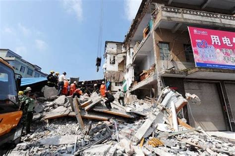 组图:广西贵港一楼房倒塌12人被埋 致3死9伤_大成网_腾讯网