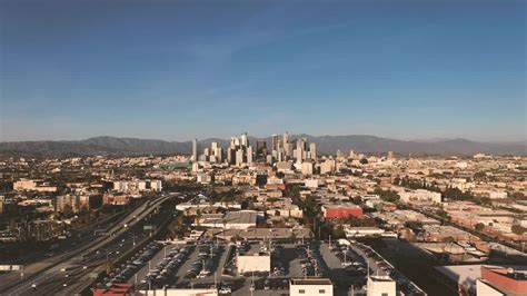 4K无人机日落时洛杉矶市中心的视频，作为稳固的镜头—高清视频下载、购买_视觉中国视频素材中心