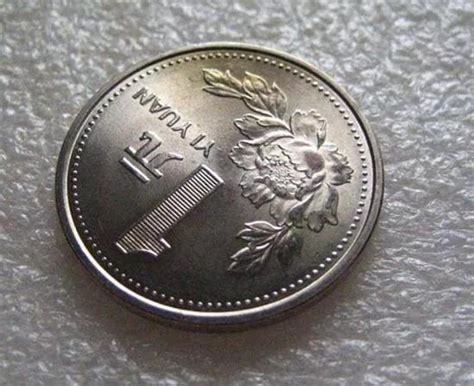常见的牡丹一元硬币，一卷价值2600元，谁家还有？__财经头条