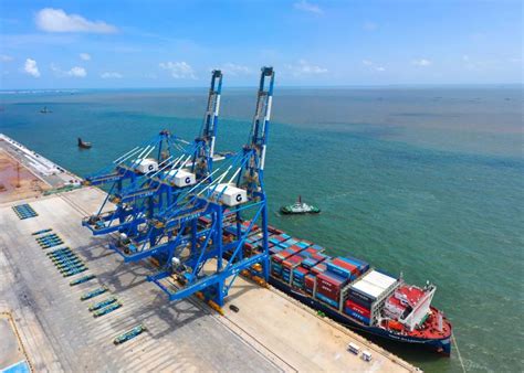 北部湾港首个30万吨级干散货自动化码头平台实现全线贯通_北部湾港股份有限公司