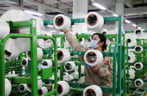 江苏泗阳：纺织企业生产忙-人民图片网