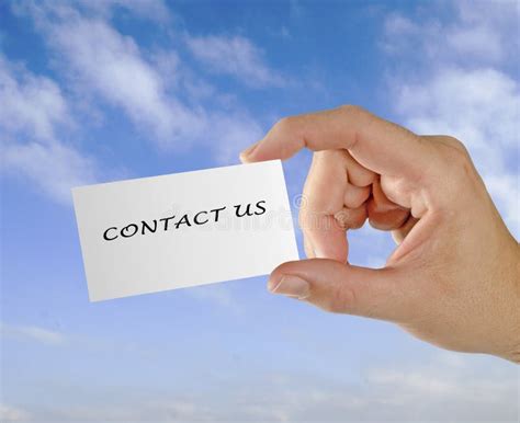 Hand with card CONTACT US stock image. Image of placeholder - 110920025