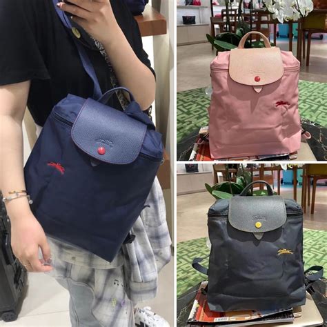 香港品牌女包2022新款时尚气质双肩包大容量简约旅行书包真皮背包-淘宝网