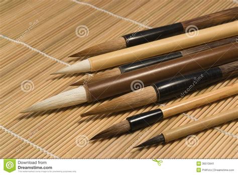 Chinese Brushes on Wooden Mat Detail Stock Image - Image of cool, asia ...