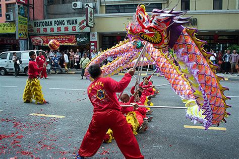 A dragon dance is performed as part of Chinese New Year celebrations ...