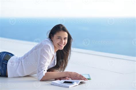 relaxed young woman at home 10830587 Stock Photo at Vecteezy