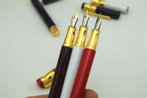 低价销售烂笔头740型商务依金钢笔中小学生钢笔练字书法笔签字笔-阿里巴巴