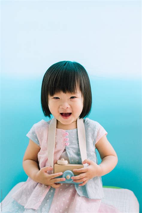 "Cute Chinese Little Girl" by Stocksy Contributor "Pansfun Images" - Stocksy