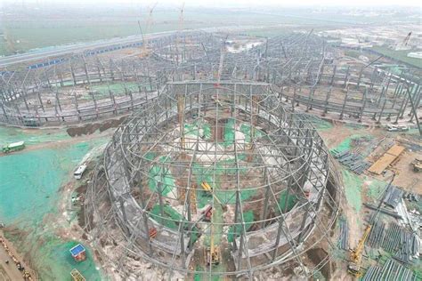 邢台123：邢台国际会展中心项目钢结构封顶，预计2023年底完成建设