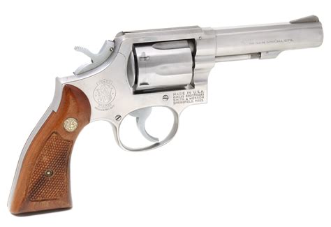 #4: A BOXED STAINLESS STEEL SMITH & WESSON 38 CAL REVOLVER