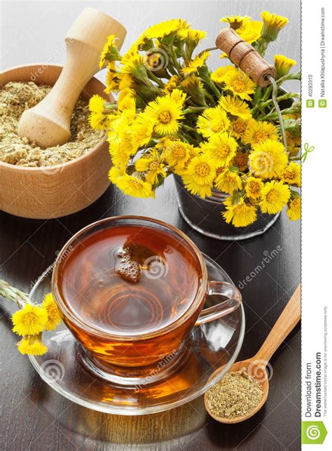 Healthy Tea, Bucket with Coltsfoot Flowers and Mortar on Table Stock ...