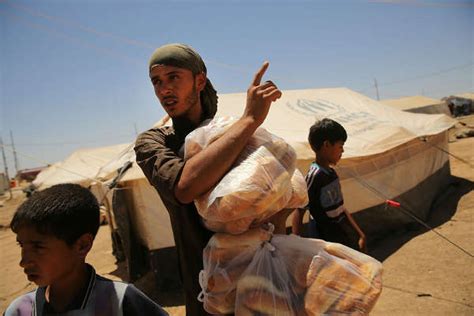 摄影师记录伊拉克难民生存现状_海南频道_凤凰网