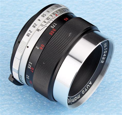 The Revuenon 55 mm f/ 1.4 Auto (1) Lens. Specs. MTF Charts. User Reviews.