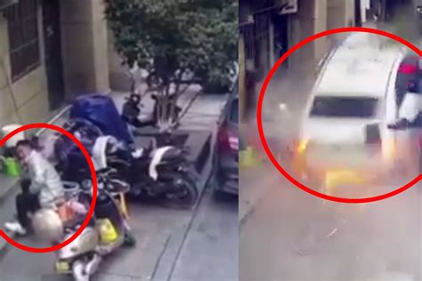 监拍：广西梧州一摩托车撞掉头奥迪 车轮卡入车内 驾驶员疑未成年_凤凰网视频_凤凰网
