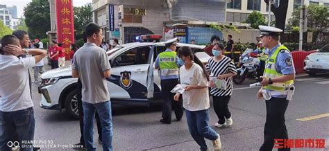 高考开考前1分钟 交警把跑错考点的女生送进考场-杭州新闻中心-杭州网