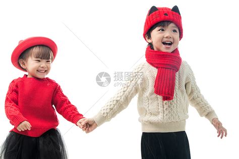 快乐东方人有趣的兄妹两人穿新衣服庆祝新年高清图片下载-正版图片501916706-摄图网