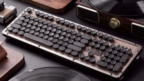 机械键盘哪种轴按起来声音比较小